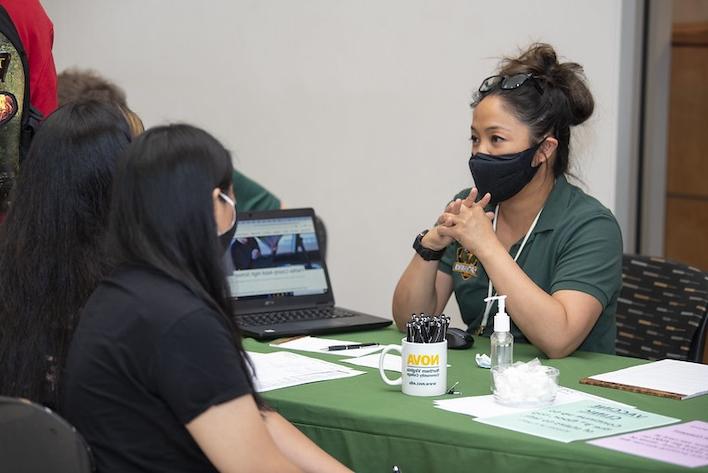 image of a counselor with a student